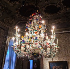 In the Brustolon Room, hangs this fabulous polychrome glass chandelier, with twenty candle holders in two orders